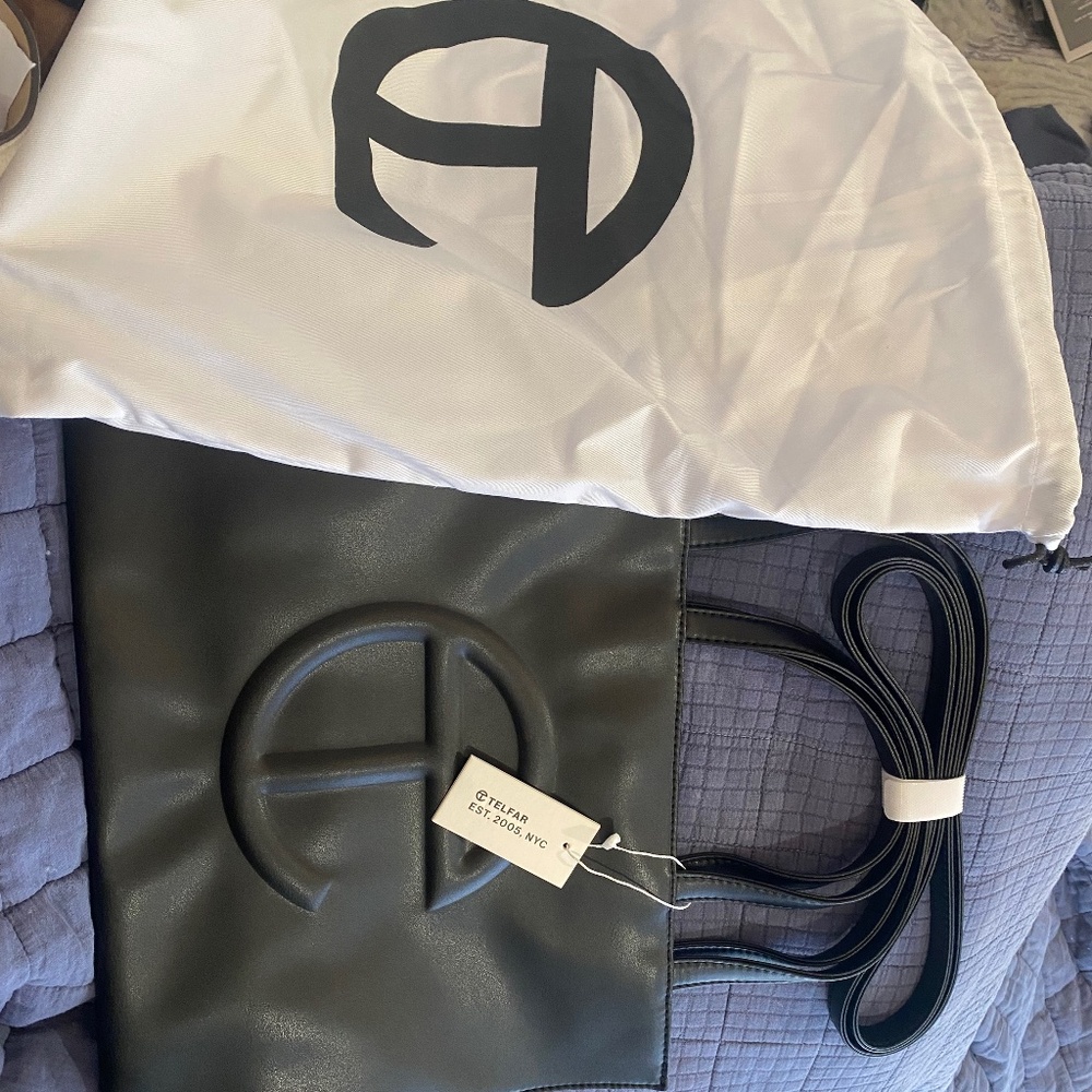 brand new with tags and dust bag